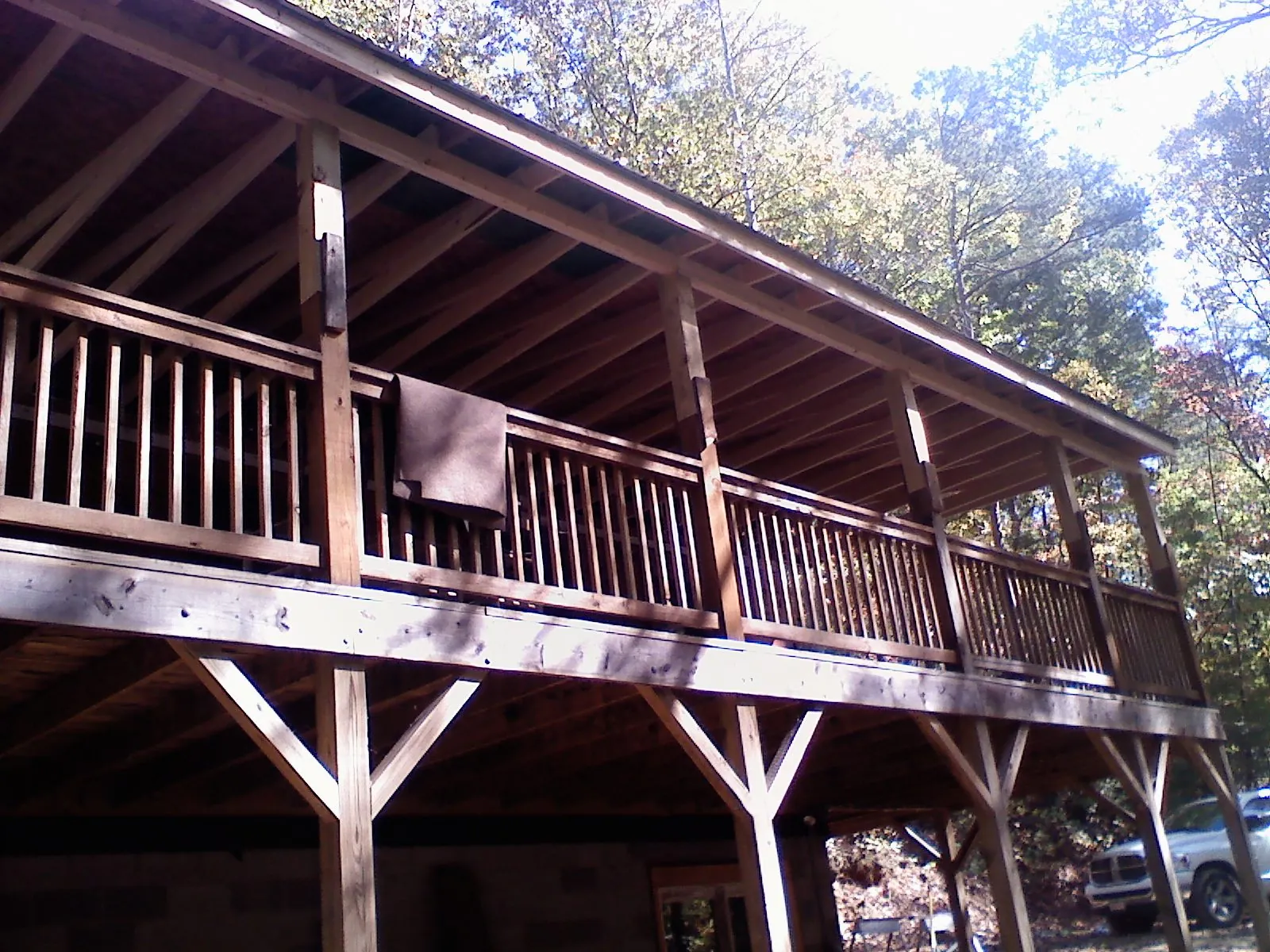 Timber framing under a new elevated porch and deck — Roof Leak Repair in Bell Gardens by Roofing Brothers